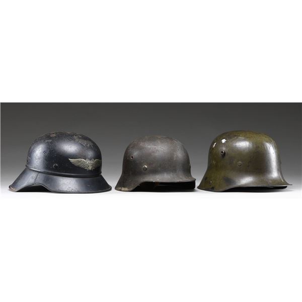 3 GERMAN HELMETS.