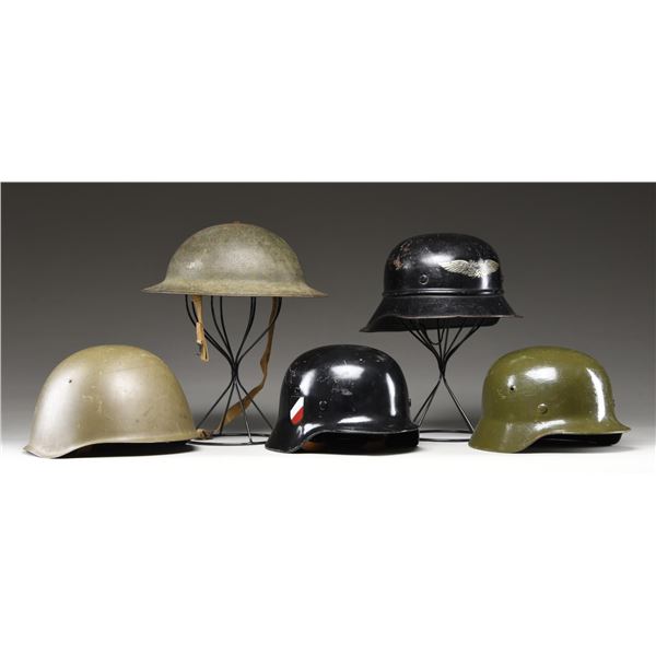 3 GERMAN HELMETS AND 2 OTHERS.