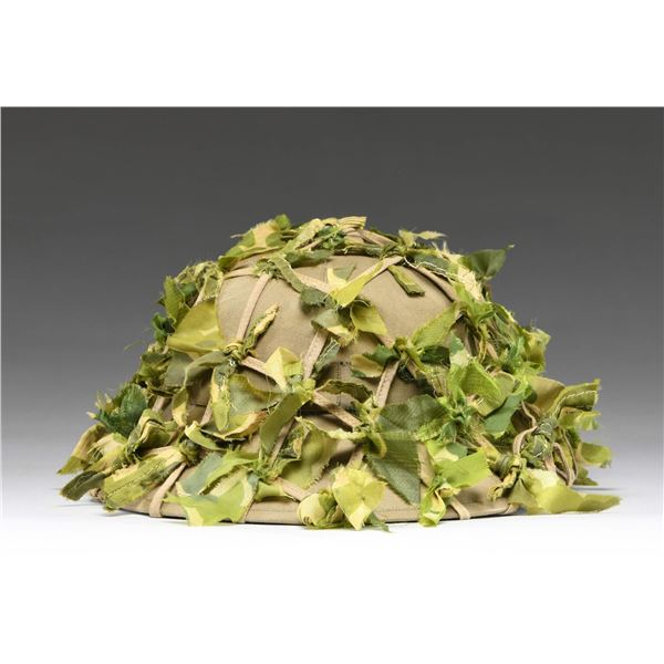 NORTH VIETNAMESE CAMOUFLAGED PITH HELMET.