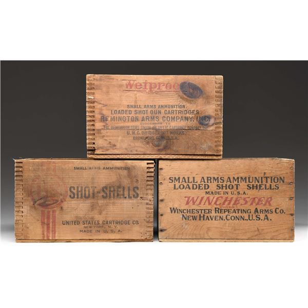 THREE ANTIQUE WOODEN SHOT SHELL CASES.