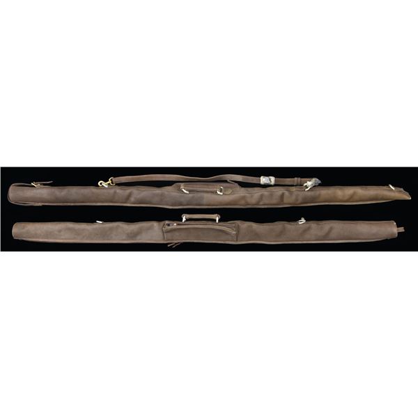2 FINE BUFFALO HIDE LONG BOW CASES.
