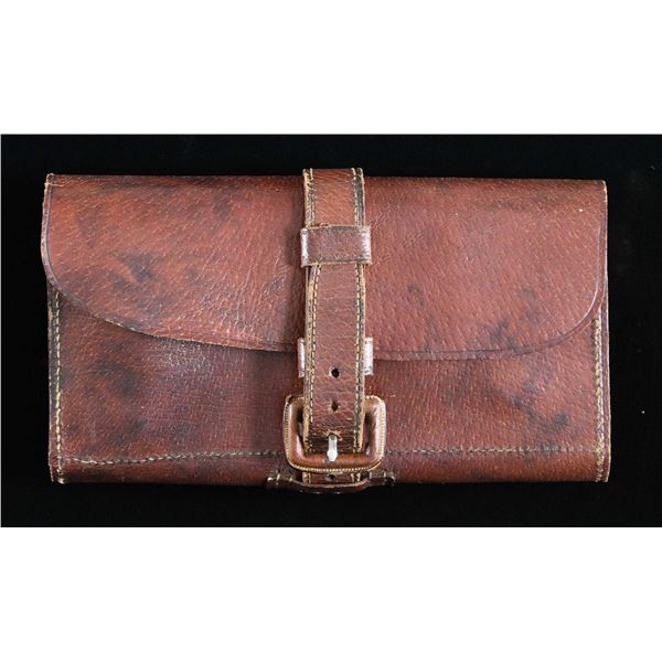 LEATHER POUCH OF SPARE PARTS FOR SIDELOCK GUNS.