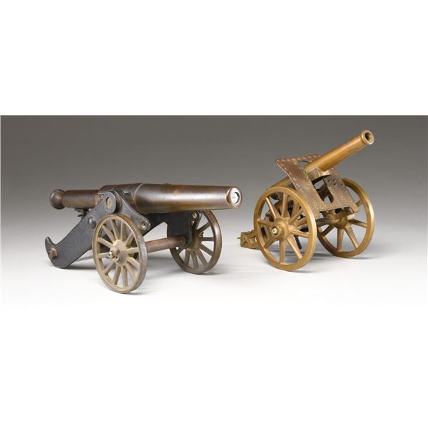 LOT OF 2 SMALL CANNONS.