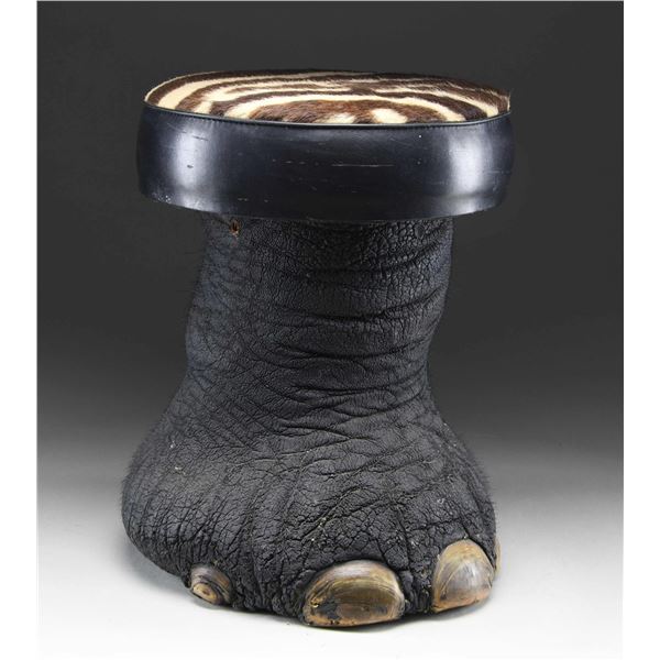 REAL ELEPHANT FOOT MADE INTO A FOOT STOOL OR
