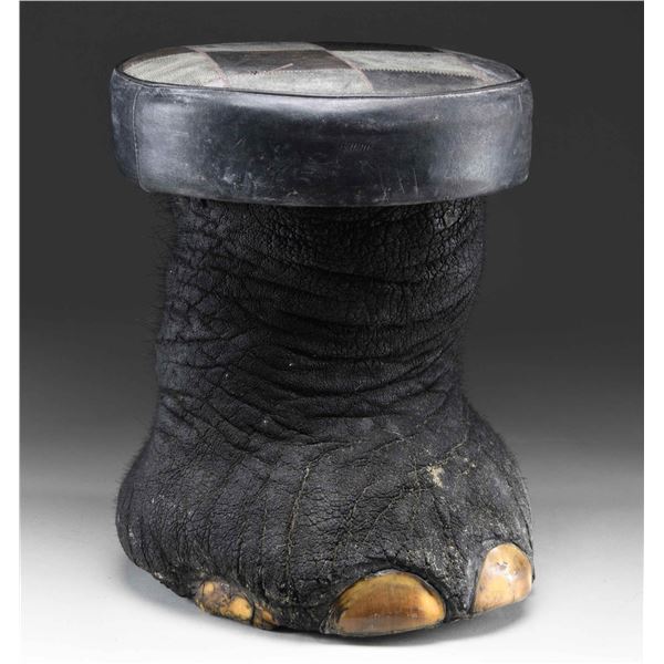 REAL ELEPHANT FOOT MADE INTO A FOOT STOOL OR