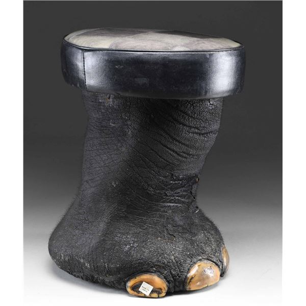 REAL ELEPHANT FOOT MADE INTO A FOOT STOOL OR