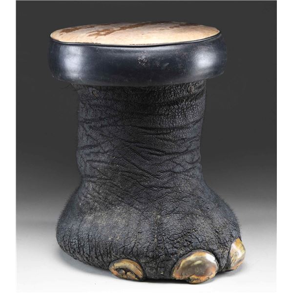 REAL ELEPHANT FOOT MADE INTO A FOOT STOOL OR