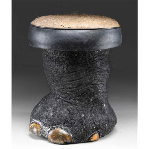 REAL ELEPHANT FOOT MADE INTO A FOOT STOOL OR