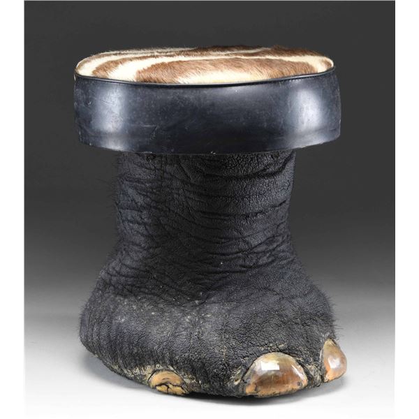 REAL ELEPHANT FOOT MADE INTO A FOOT STOOL OR