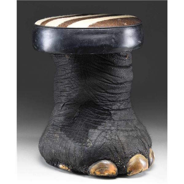 REAL ELEPHANT FOOT MADE INTO A FOOT STOOL OR