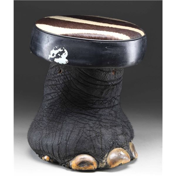 REAL ELEPHANT FOOT MADE INTO A FOOT STOOL OR