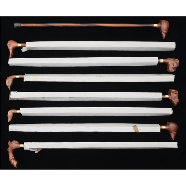 8 CARVED WOODEN CANES OR WALKING STICKS BY LEWIS