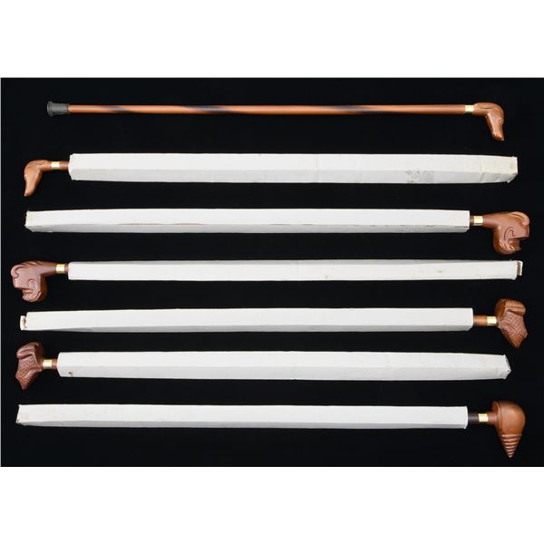 7 CARVED WOODEN CANES OR WALKING STICKS BY LEWIS