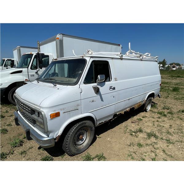Chevy van. VIN 1GCEG25K4SF150314