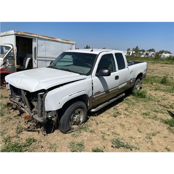 Chevy 2500 Lt  4x4 truck. Various grills, parts, and misc in box. VIN 1GCGK29U74Z133947