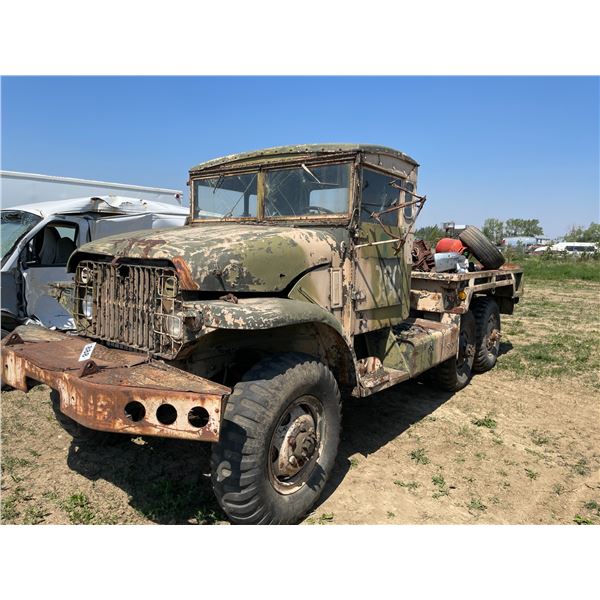 Military truck. Tires hold air. Box has tires, truck door, misc parts, sold for parts