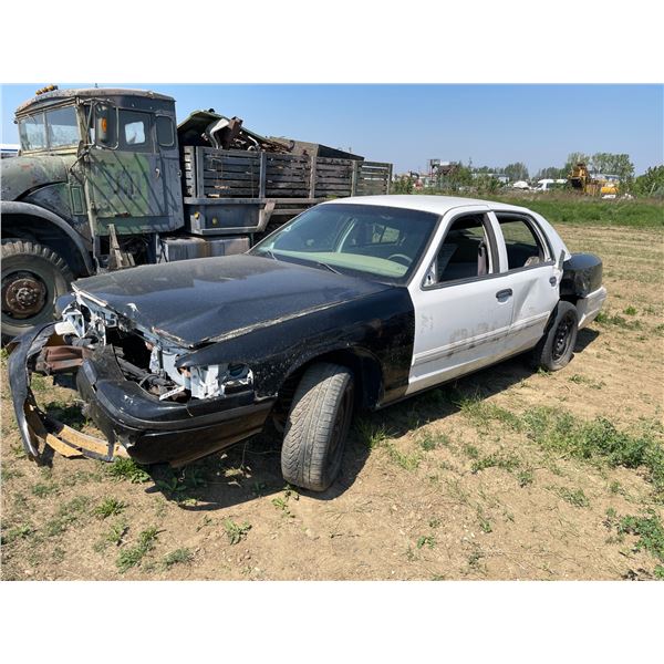 Ford police cruiser, sold for parts