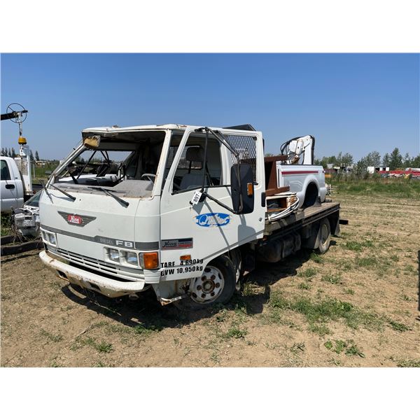 Hino diesel picker truck. Flat deck, trailer hitch, truck box, picker pieces.  VIN  JHBEB1539P1T1039
