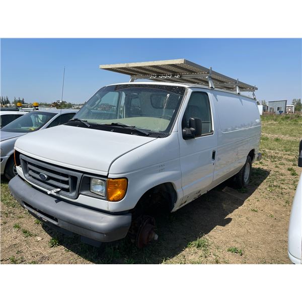 2005 Ford Van. Flex fuel, roof rack. VIN 1FTSE34L55HB50016