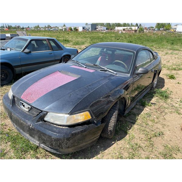 1999 Ford Mustang. VIN 1FAFP4044XF149735, sold for parts
