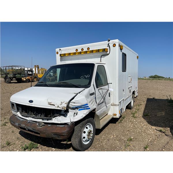 Ford E350 Van.  Roll up rear door. Tires hold air, sold for parts
