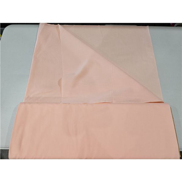 Peach-Colored Fabric Roll