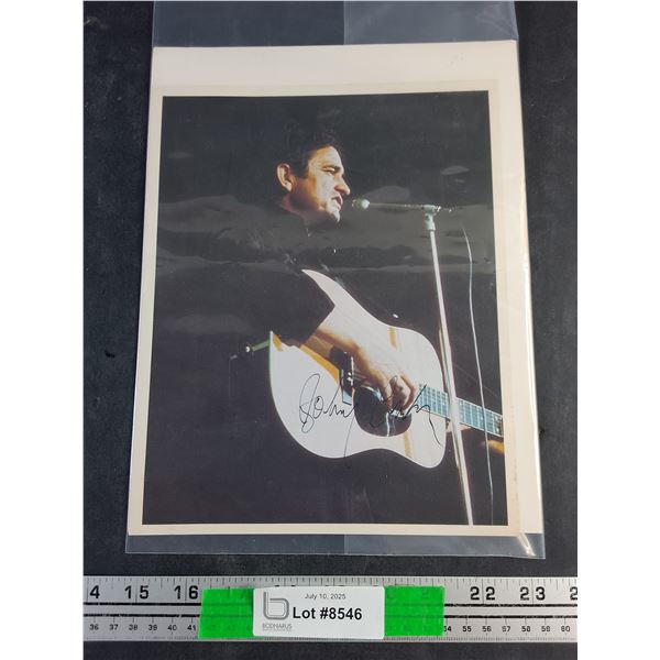 Johnny Cash Autographed Poster 11" x 8 1/2" - Authenticity Not Guaranteed