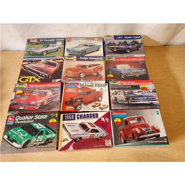 409 -- 12 COLLECTABLE REVELL, AND AMT CLASSICS MODEL KITS(SCAT PACK CHARGER, DODGE SIDEWINDER, '71 H