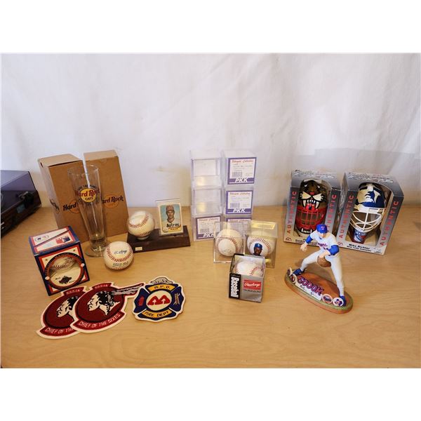418 -- LOT OF COLLECTABLLE SPORTS MEMORABELIA, BASEBALL HOLDERS, NOLAN RYAN CARD, BALL, AND STATUE,