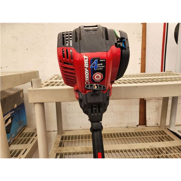 429 -- TROY BILT 4 CYCLE WEED WHACKER WITH HEAVY DUTY TRIMMING BLADE