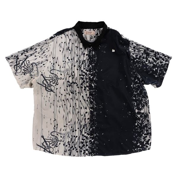 A Walt Disney World Cast Member Music Note Shirt.