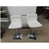 Image 1 : 2 Swivel Leather/Leather-Style Bar Stools 
