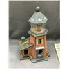 Image 2 : Lot of 2 Bird Houses Lighthouse and Flower Shop (never used)