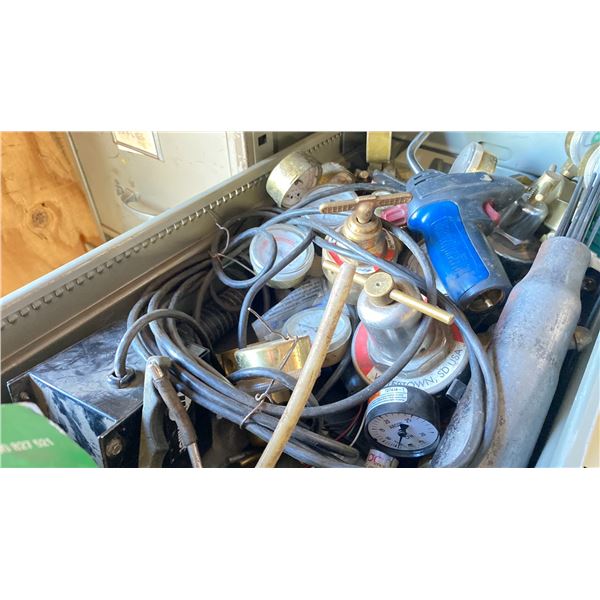 4 DRAWER METAL CABINET FILLED WITH OXY/ACETYLENE REGULATOR GAUGES AND MISC. ITEMS