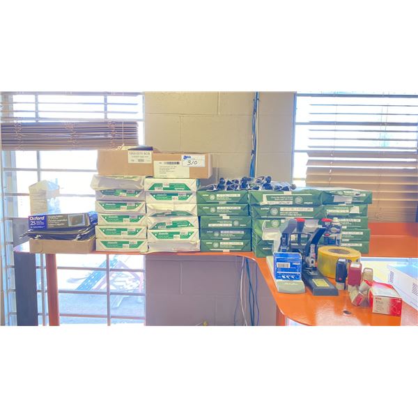 GROUP OF OFFICE SUPPLIES - PRINTER PAPER, STAPLERS, INK STAMPS, ETC.