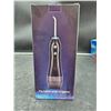Image 2 : Portable Oral Irrigator with Cordless Water Floss Functionality