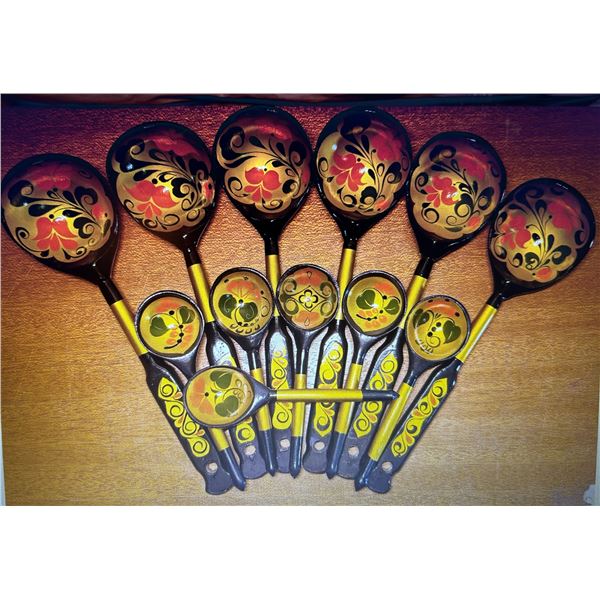 Variety if different sized painted wooden spoons