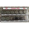 Image 1 : Canada 1999 Millennial Set of 12 quarters in commemorative pouch sleeve.