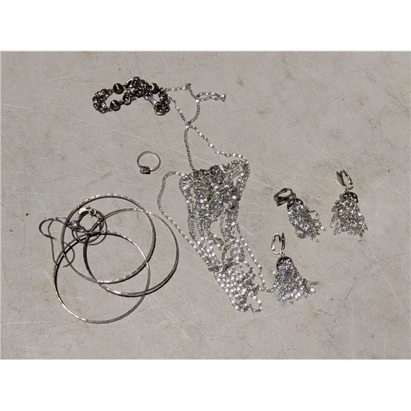 8.5" chain w/ Solitaire stone  3.5" bracelet, size 6 Diamond ring, and 3 Bangles