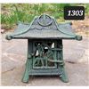 Image 1 : Cast iron outdoor citronella candle burner.