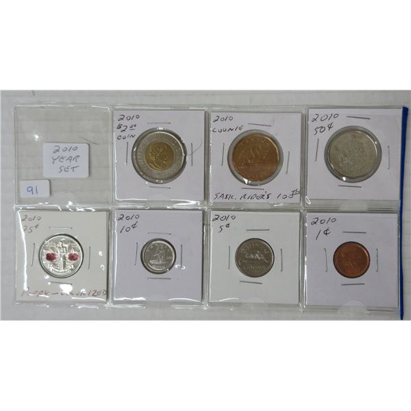 2010 canadian year set w/ coloured quarters and sask rider loonie