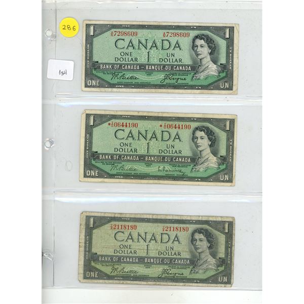 (3) 1954 Canadian One Dollar.