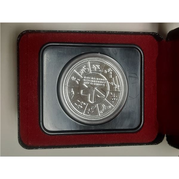 1976 Silver Dollar. Commemorates the Commonwealth Games held in Edmonton. Housed in its original RCM