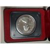 Image 2 : 1976 Silver Dollar. Commemorates the Commonwealth Games held in Edmonton. Housed in its original RCM