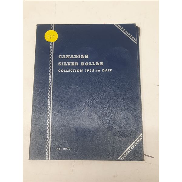 Empty Canadian Silver Dollar blue Whitman folder 1935 – 1957. Used.
