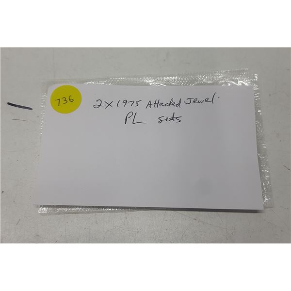 Lot of 2 1975 Proof Like Sets. Both the Dollars have Attached Jewels. Missing the envelopes & COA.