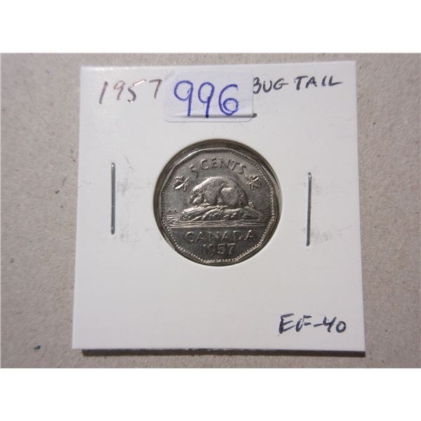 1957 Bug Tail Nickel 5 Cents. There is a small Die Chip on the end of the beaver’s tail tha