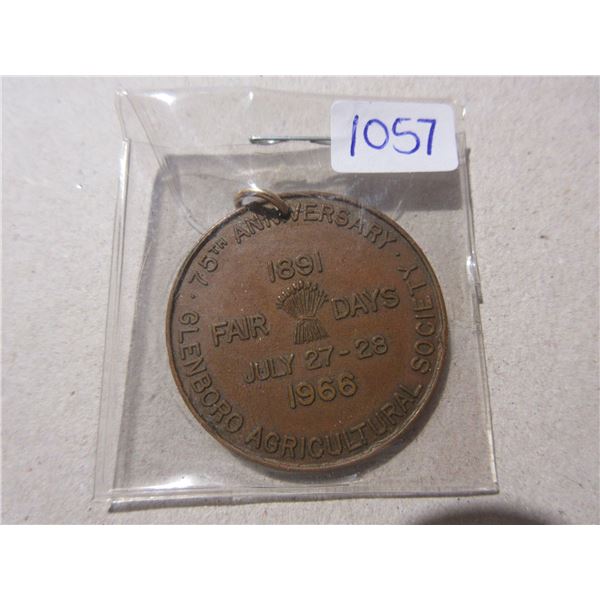 1891 – 1966 Glenboro Manitoba Trade Dollar. 75th Anniversary of the town. With loop. Unc.