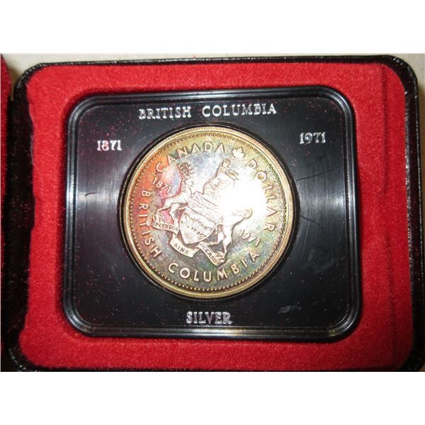 1971 British Columbia Silver Dollar. Specimen. Housed in its original RCM case. Nicely Toned.