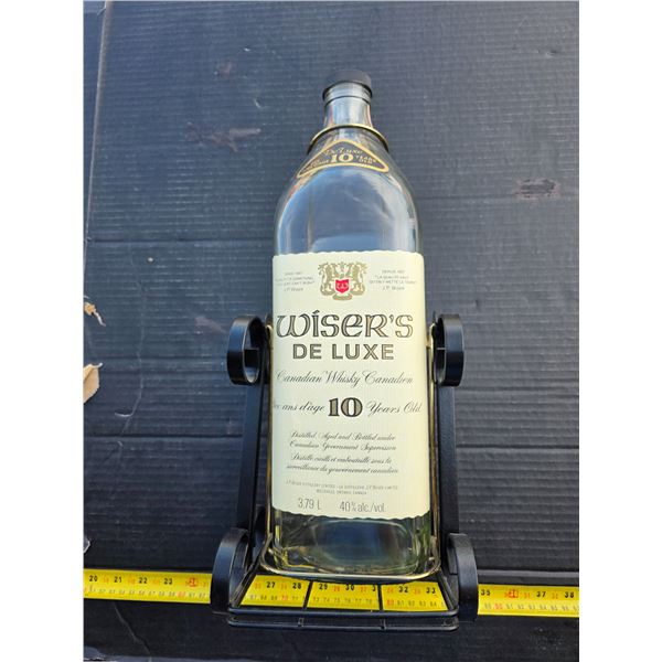 Wisers deluxe whiskey bottle and stand